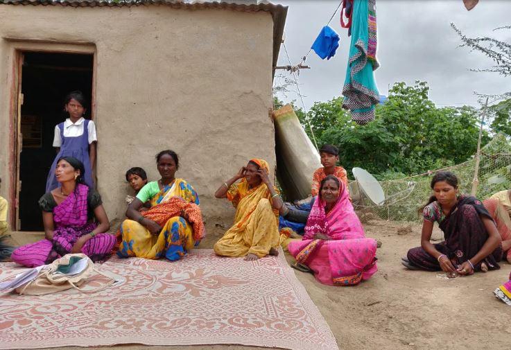 Indubai Gailwad( Old Lady in Yellow Sari in Middle) at Bhil Hamlet at Alegoan Paga village in Pune