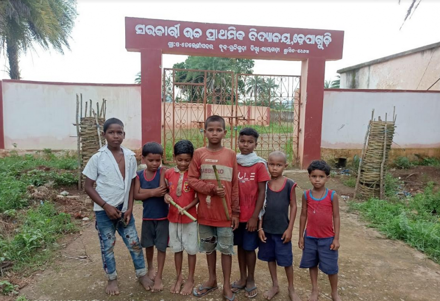 Children playing in front of the Dhepagudi UP school in their village in Muniguda