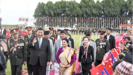 Xi