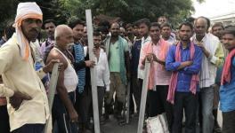 मज़दूरों पर दोहरी मार