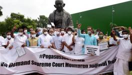 पेगासस मामले की जांच की मांग को लेकर विपक्षी दलों का संसद परिसर में प्रदर्शन